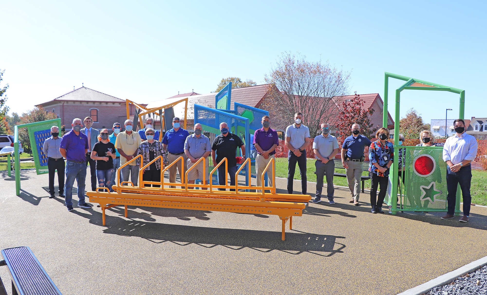 group of people standing on playground
