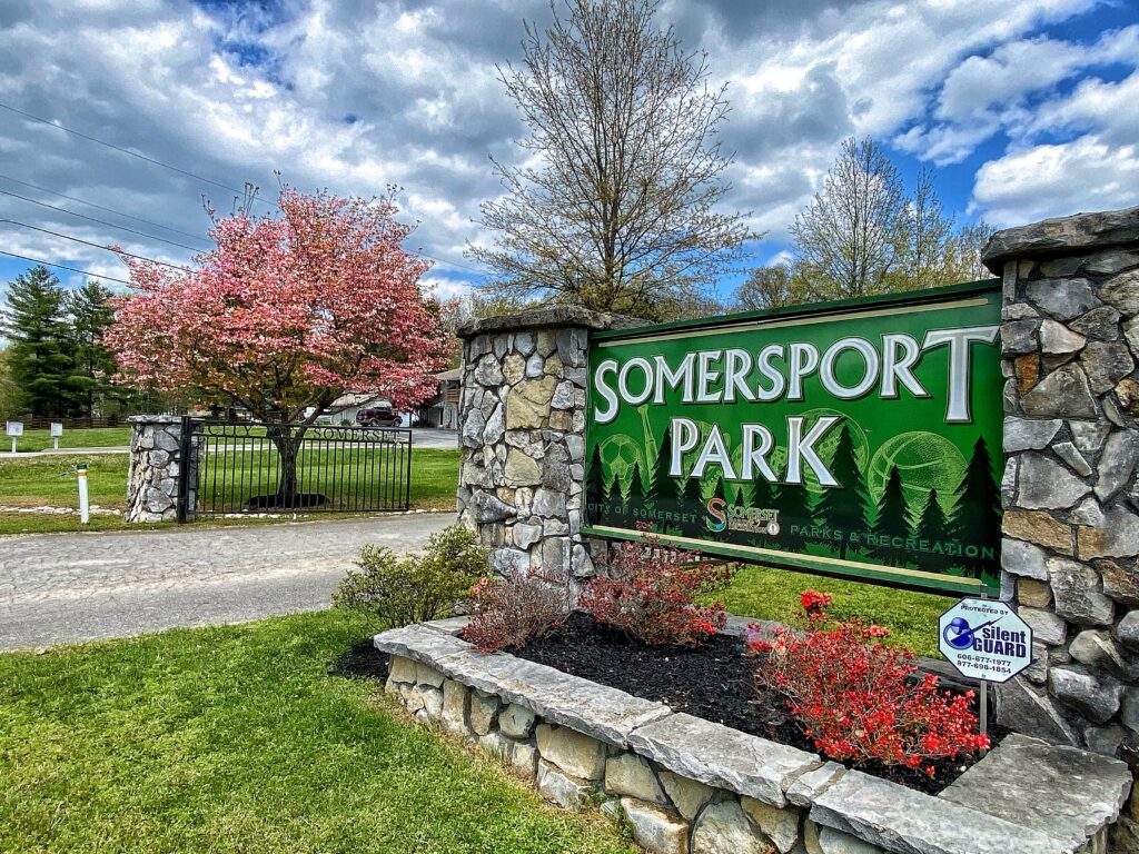 stone sign that says Somersport Park